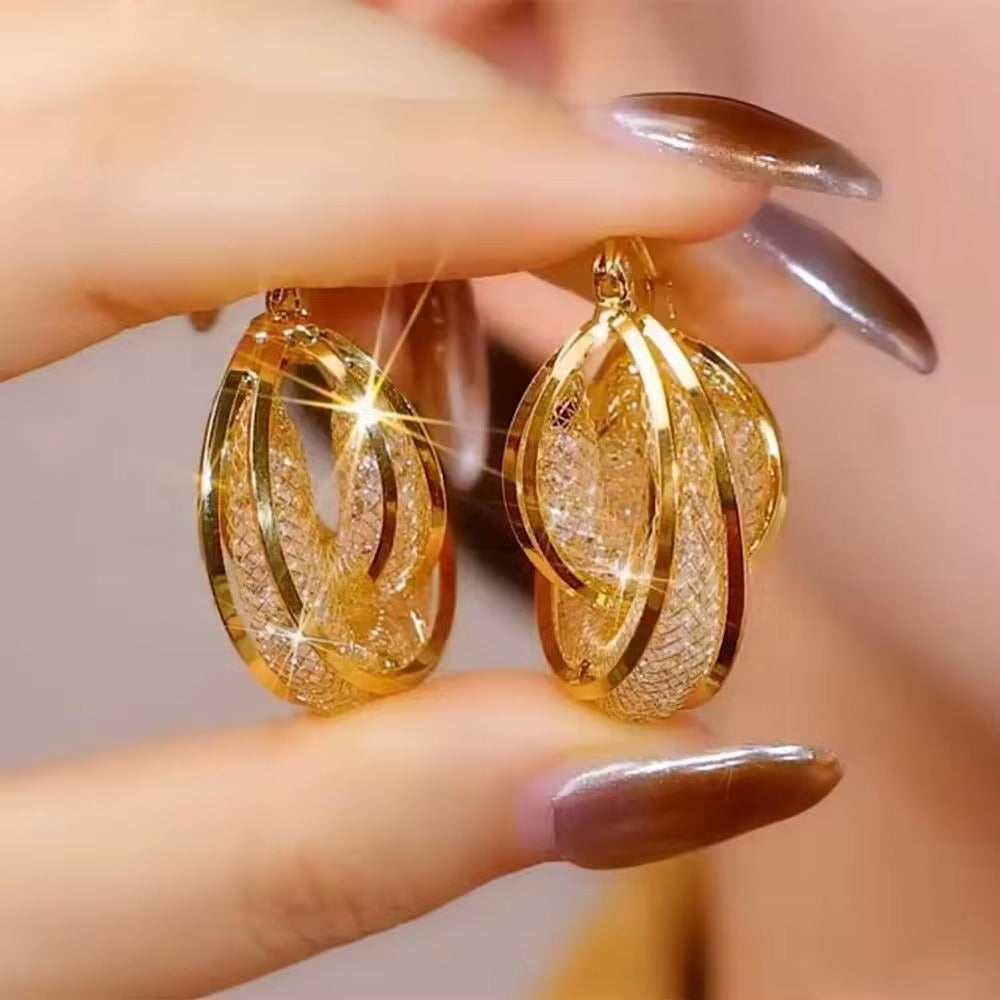 Boucles d'oreilles créoles plaquées or
