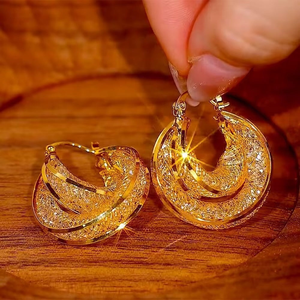 Boucles d'oreilles créoles plaquées or